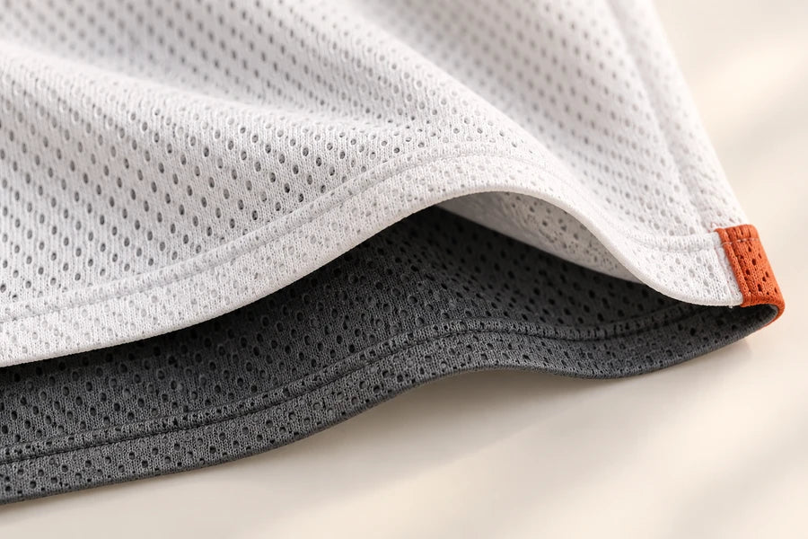 Illustration of two separate fabric layers in a reversible uniform