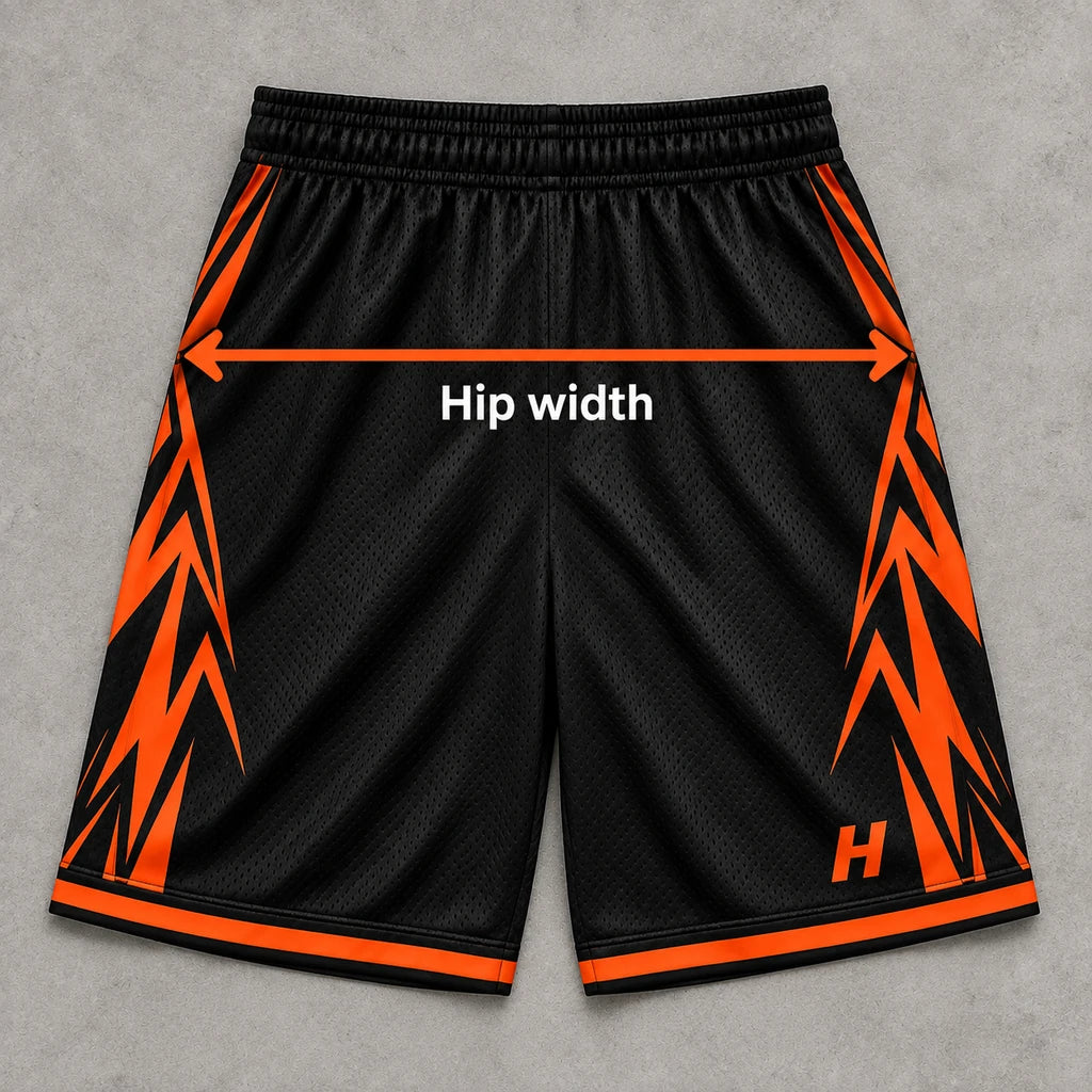 Shorts laid flat, showing the widest hip width measured straight across